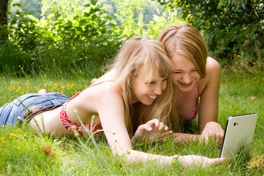 Two girls are having fun in the summer sun