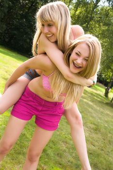 Two girls are having fun in the summer sun