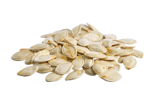 Closeup of pile of fresh raw whole pumpkin seeds isolated on white