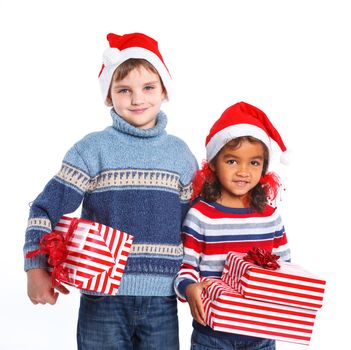 Smiling little mullato girl and her brather in Santa's hat with gift box, isolated on white