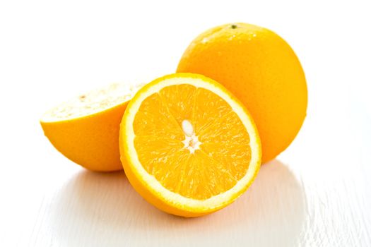 Fresh whole and halve Oranges