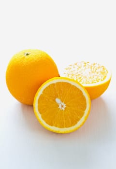 Fresh whole and halve Oranges