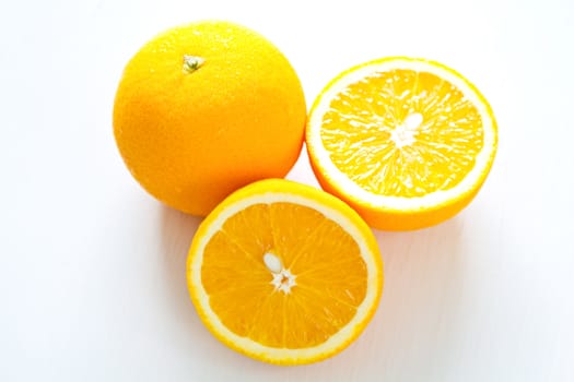 Fresh whole and halve Oranges