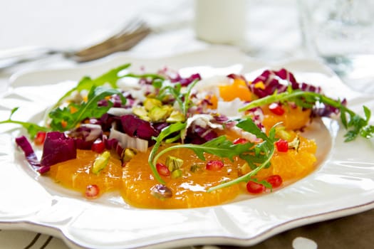 Orange with Radicchio,Pomegranate and Pistachio salad