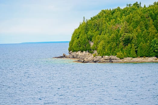Rocky Geargian Bay costline near Tobermory in Bruce Peninsula, Ontario Canada