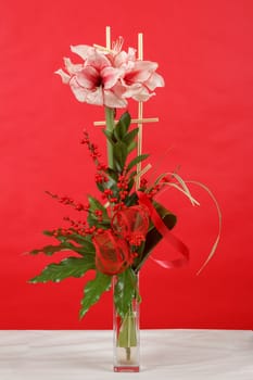 bouquet of pink lily flower on red background