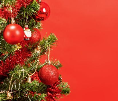 detail of decorated christmas tree with red balls