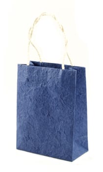 Blue mulberry paper bag isolated.