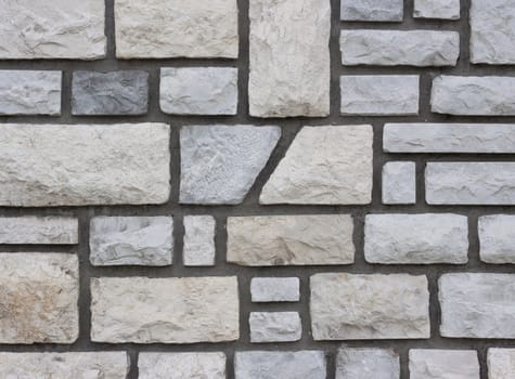 Stone wall with cement.