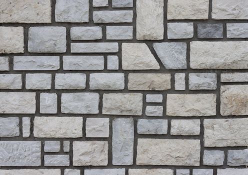 Stone wall with cement.