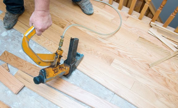 A hardwood floor installation in progress. 