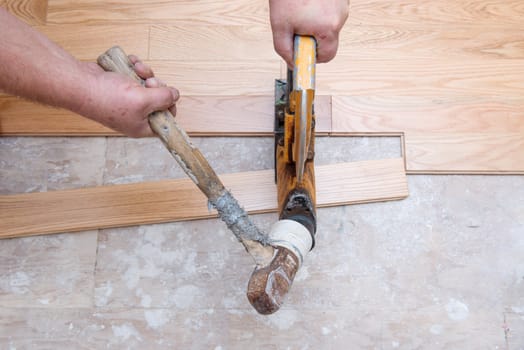 A hardwood floor installation in progress. 