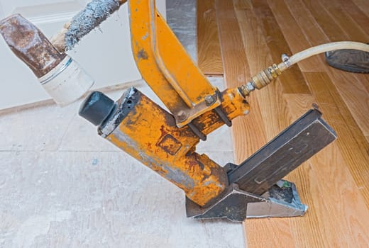 A hardwood floor installation in progress. 