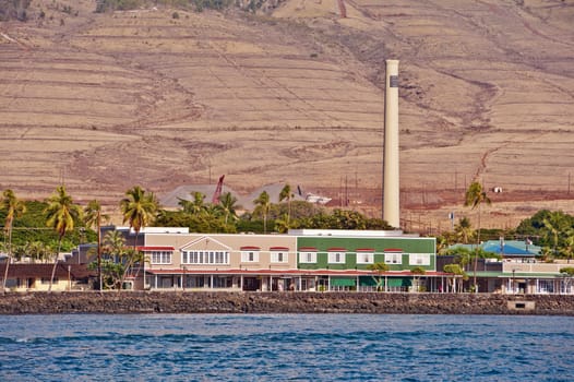 Pioneer Mill Company, located on Maui’s west side, was founded in 1860. It was one of Hawai‘i’s last remaining sugar plantations at the time of its closure in 1999. By 2002, the abandoned mill, fallow fields, and plantation-era homes seemed to be all that remained of the sugar company’s once-dominant influence on West Maui life.

