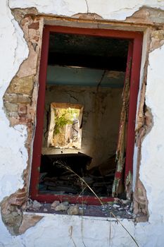 old window in destroyed abandoned house