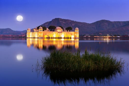 The palace Jal Mahal at night.  Jal Mahal (Water Palace) was built during the 18th century in the middle of Mansarovar Lake.  Jaipur, Rajasthan, India. 