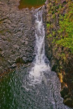 This waterfall is in the Haleakala National Park near Hana on the island of Maui.