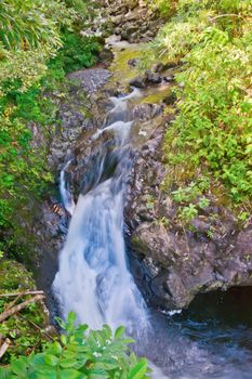 This waterfall is in the Haleakala National Park near Hana on the island of Maui.