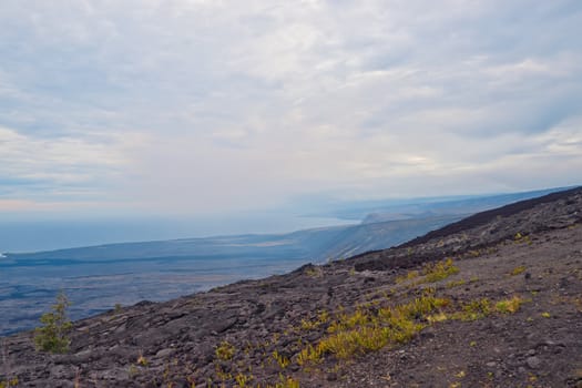 Solidified Cracked Lava Flow in Volcano, volcanic landscape when driving Chain of craters road in Big Island Hawaii