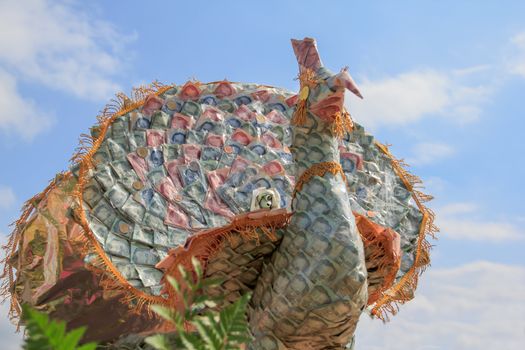 origami peacock from a money of thailand