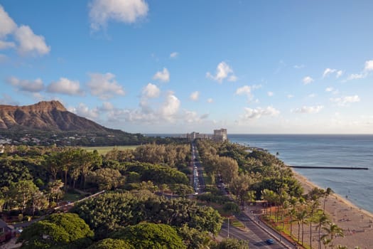 Aerial view of Diamond Head Crater and Queen's surf beach on the Hawaiian island of Oahu in Honolulu.