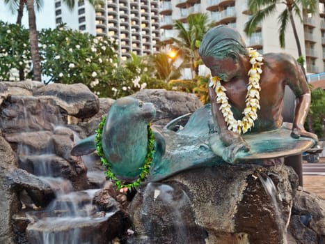  Makua & Kila-Surfer Boy & Seal Statue. The famous Makua and Kila statue, depicting a young monk seal swimming alongside a surfer boy, sits at Kuhio Beach in Waikiki

