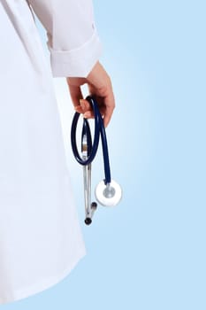 Portrait of happy successful young female doctor holding a stethoscope