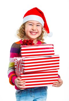 Smiling little girl in Santa's hat with gift box, isolated on white