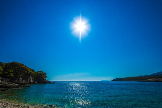 shining sun on the beach in blue