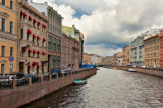 Canal in St. Petersburg against the sky with clouds