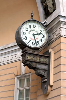 The clock on the wall at the Palace Square in St. Petersburg
