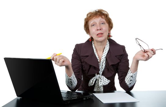 middle-aged woman at a computer on a white background