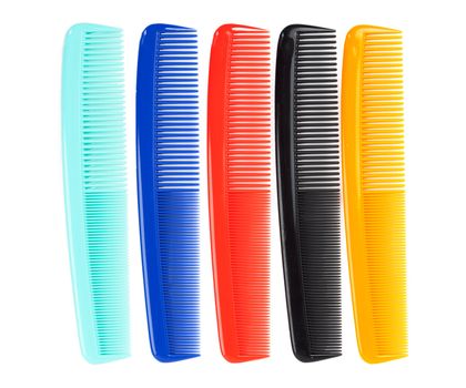 colored plastic comb isolated on white background