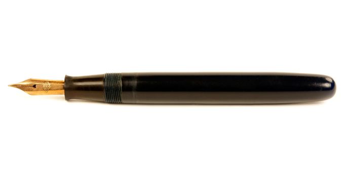 The old pen with gold nib isolated on white background