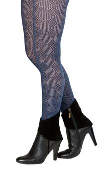 shapely female legs in pantyhose and shoes with heels in the studio on a white background
