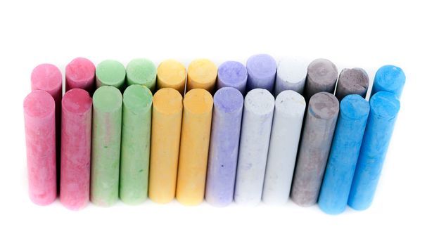 box with children's crayons on a white background
