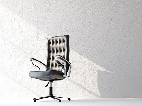 A black leather chair near the wall