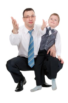 businessman and his son pulled his hands in the studio, isolate on white