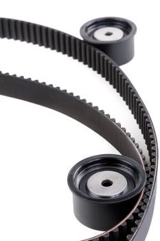 Roller and timing belt isolated on white