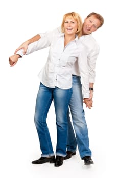 Portrait of a beautiful middle-aged couple in the studio on a white background