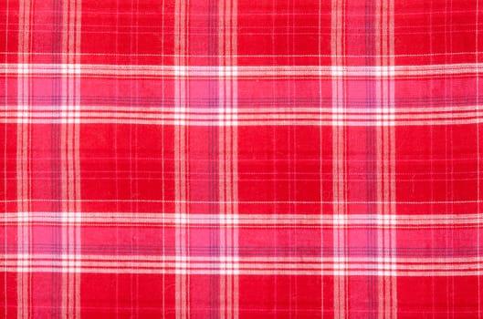 Close-up red fabric textile texture can be used as background