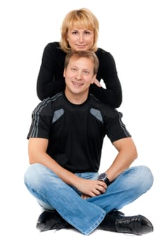 Beautiful couple in love sitting in the lotus position, isolate on white