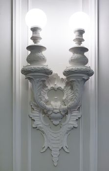 vintage wall lamp from the plaster moldings