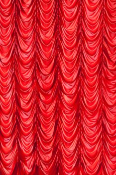 Brightly  red lit curtains for your background
