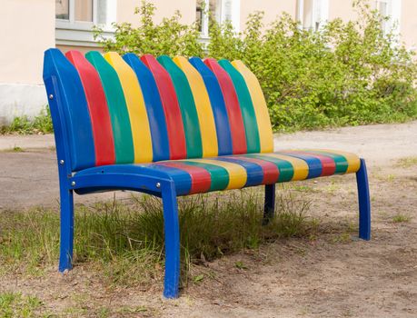 Children colored plastic bench at the playground