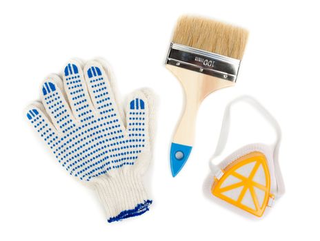 Still a pair of cotton gloves, paint brush and a dust mask.