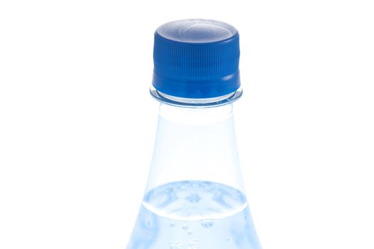 Bottle of water with bubbles on white background