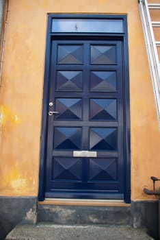 Bright vivid beautiful blue painted traditional classical front wooden door Denmark       