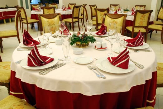 Decorated restaurant lunchroom tables ready for ceremony