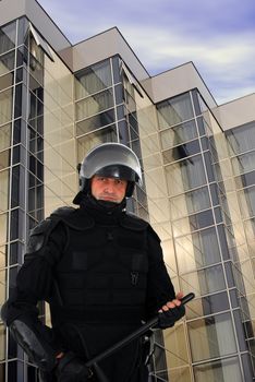 Riot policeman with full equipment